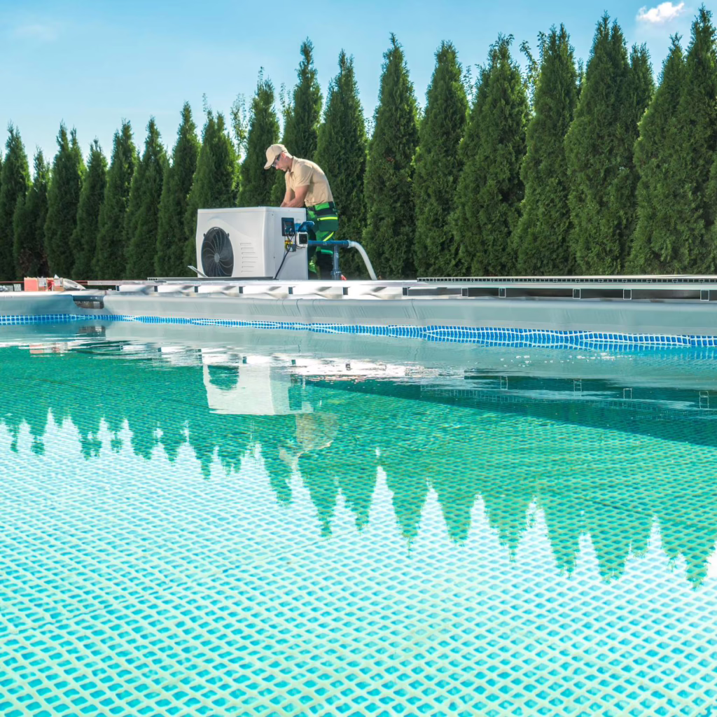 Technician installing pool water heater