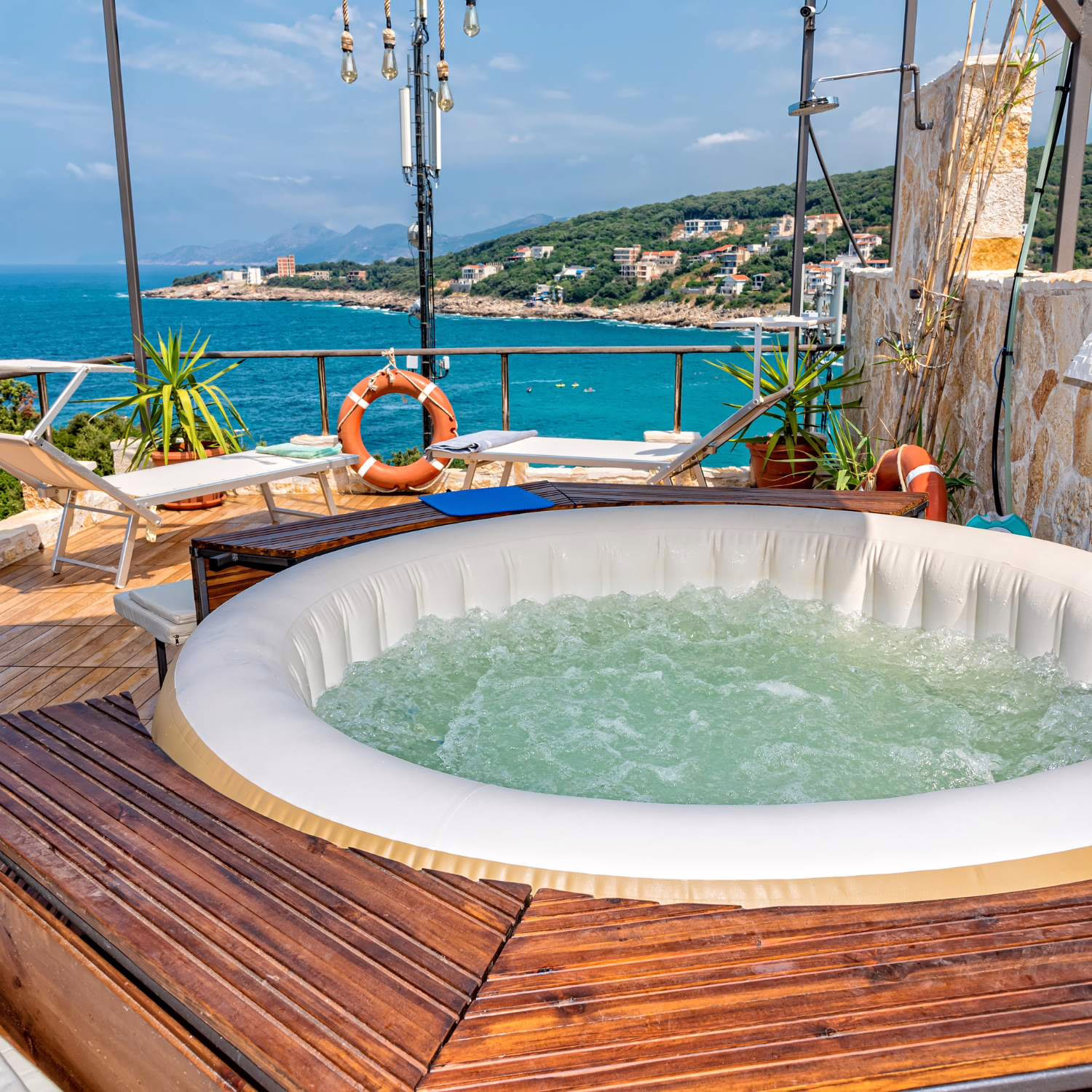 Hot tub with wooden deck and relaxation area
